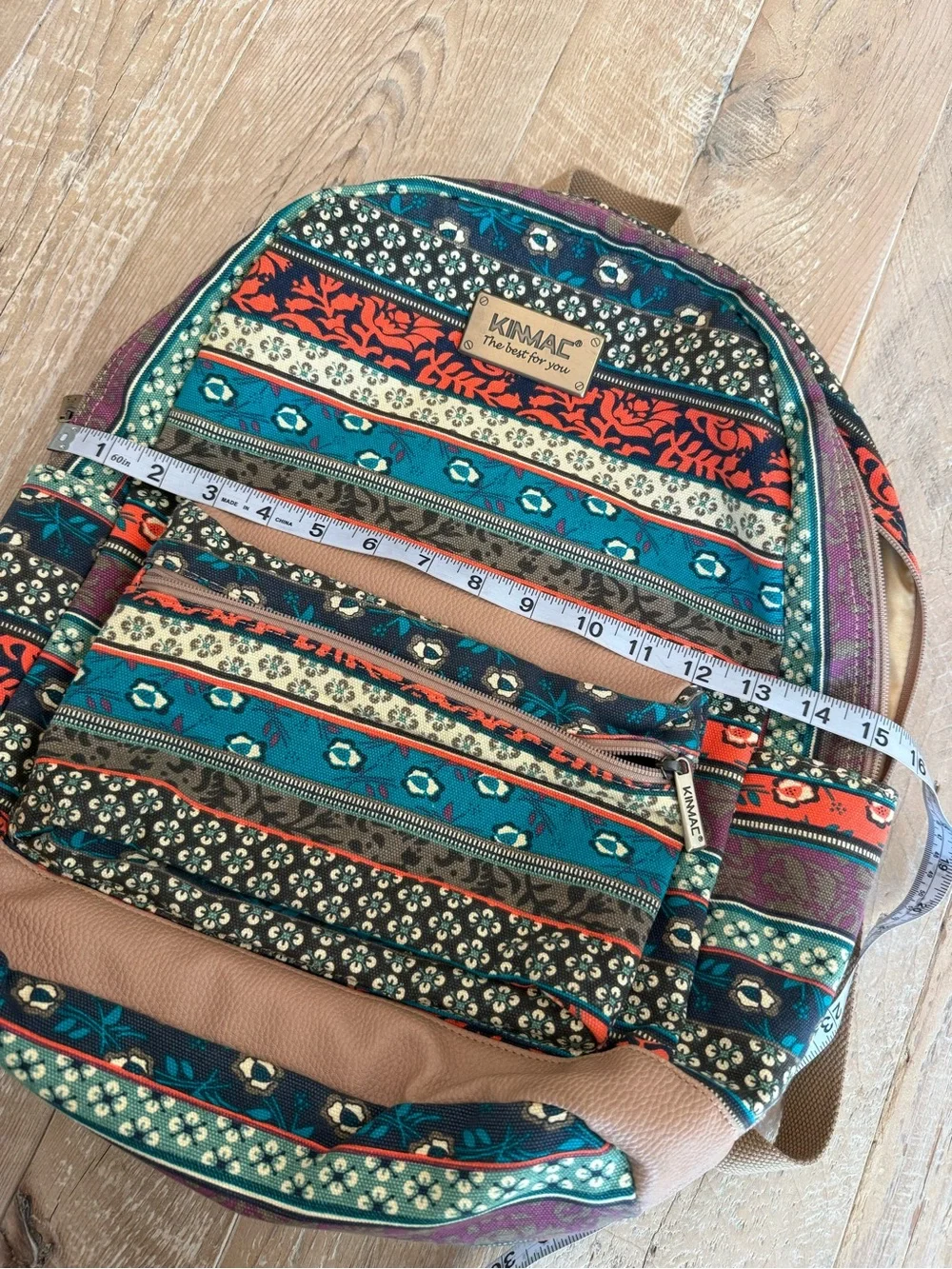 Kinmac Patterned Teal & Orange Backpack with builtin charger
